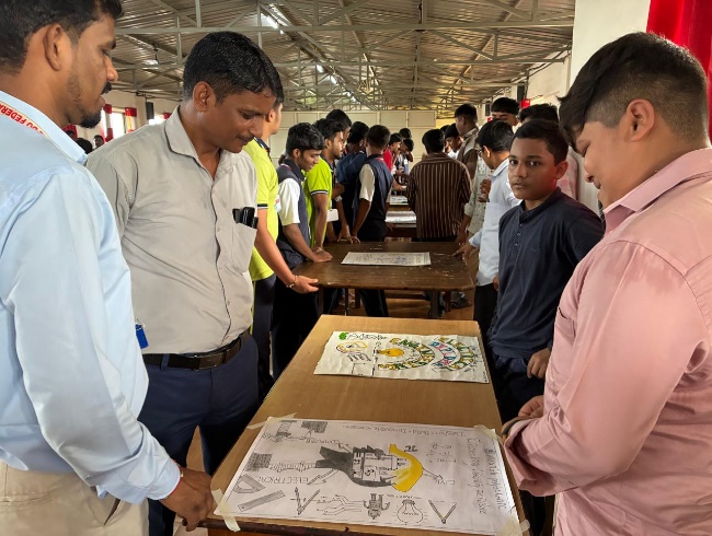 Students presenting posters during a technical competition